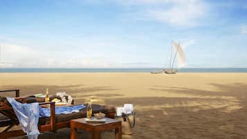 On the beach, sun loungers, beach umbrellas, beach towels