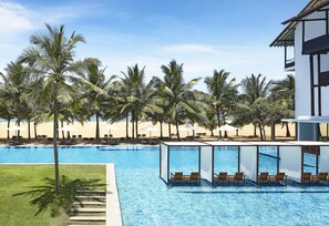 2 outdoor pools, pool umbrellas, sun loungers