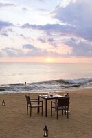 On the beach, white sand, beach towels, water skiing