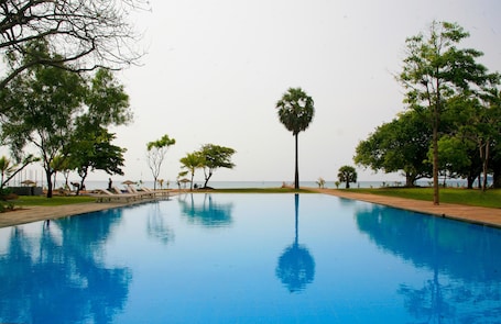 Outdoor pool, open 10:00 AM to 5:00 PM, pool umbrellas, sun loungers