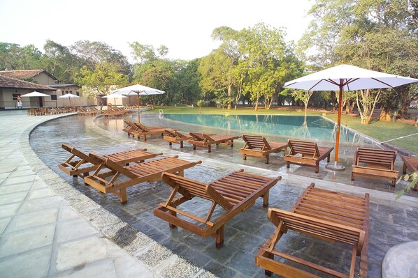 Outdoor pool, pool umbrellas, pool loungers