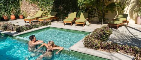 Outdoor pool, open 8:00 AM to 8:00 PM, sun loungers