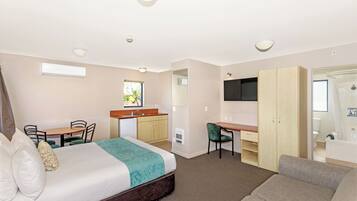 One Bedroom Unit | Living area | 32-inch Smart TV with digital channels