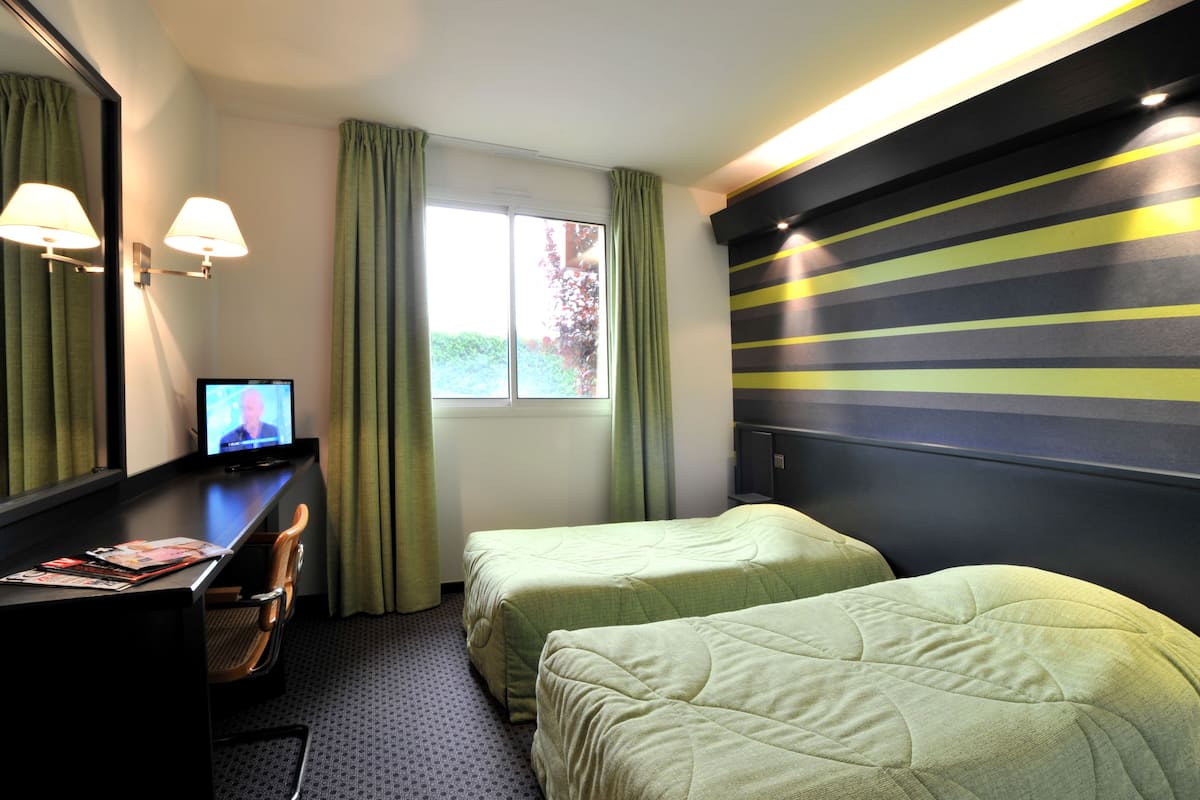 standard room, 2 single beds | desk, blackout curtains, soundproofing, iron/ironing board
