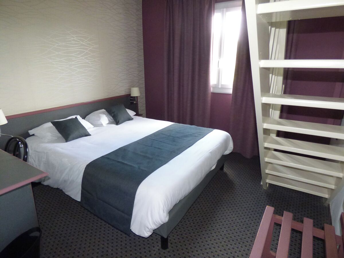 Family Room | Desk, blackout curtains, soundproofing, iron/ironing board