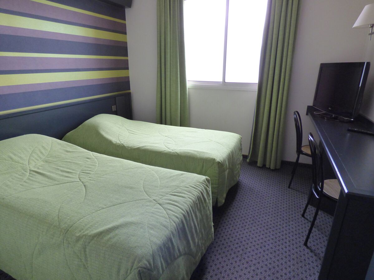 Twin Room | Desk, blackout curtains, soundproofing, iron/ironing board