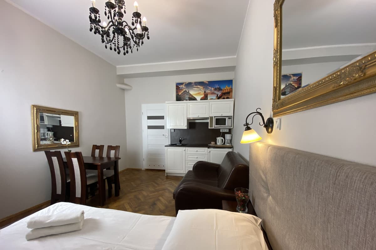 1 bedroom, desk, laptop workspace, iron/ironing board