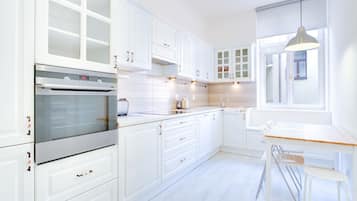 Comfort Apartment, 2 Bedrooms (Szpitalna Street) | Private kitchen | Fridge, microwave, stovetop, coffee/tea maker