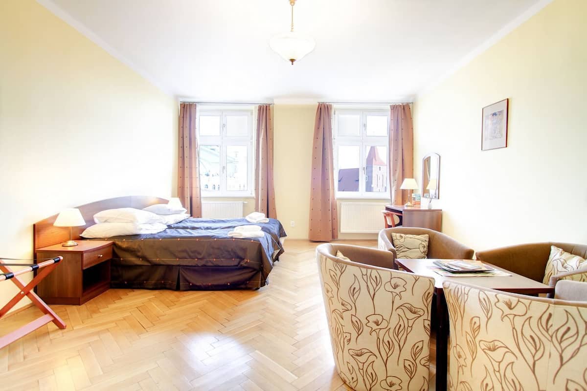 Comfort Apartment, 2 Bedrooms (Szpitalna Street) | 1 bedroom, desk, laptop workspace, iron/ironing board