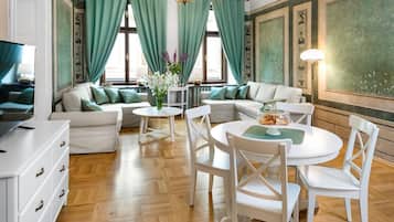 Deluxe Suite (Florianska Street) | Living area | 32-inch LCD TV with satellite channels, TV