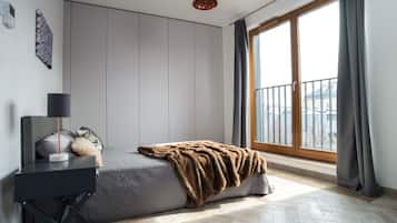 Deluxe Suite, 1 Bedroom (Lubicz Street) | 1 bedroom, desk, laptop workspace, iron/ironing board