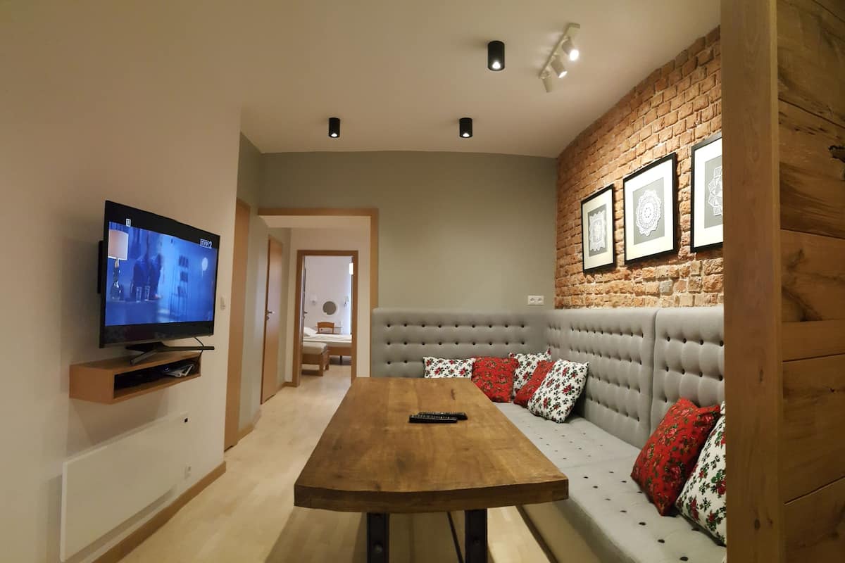 Design Apartment, 3 Bedrooms (Florianska Street) | 1 bedroom, desk, laptop workspace, iron/ironing board