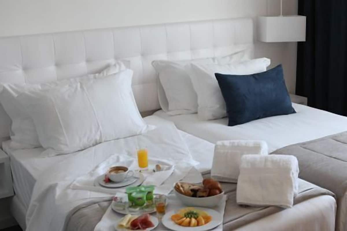 Double Room | Memory foam beds, minibar, in-room safe, individually decorated