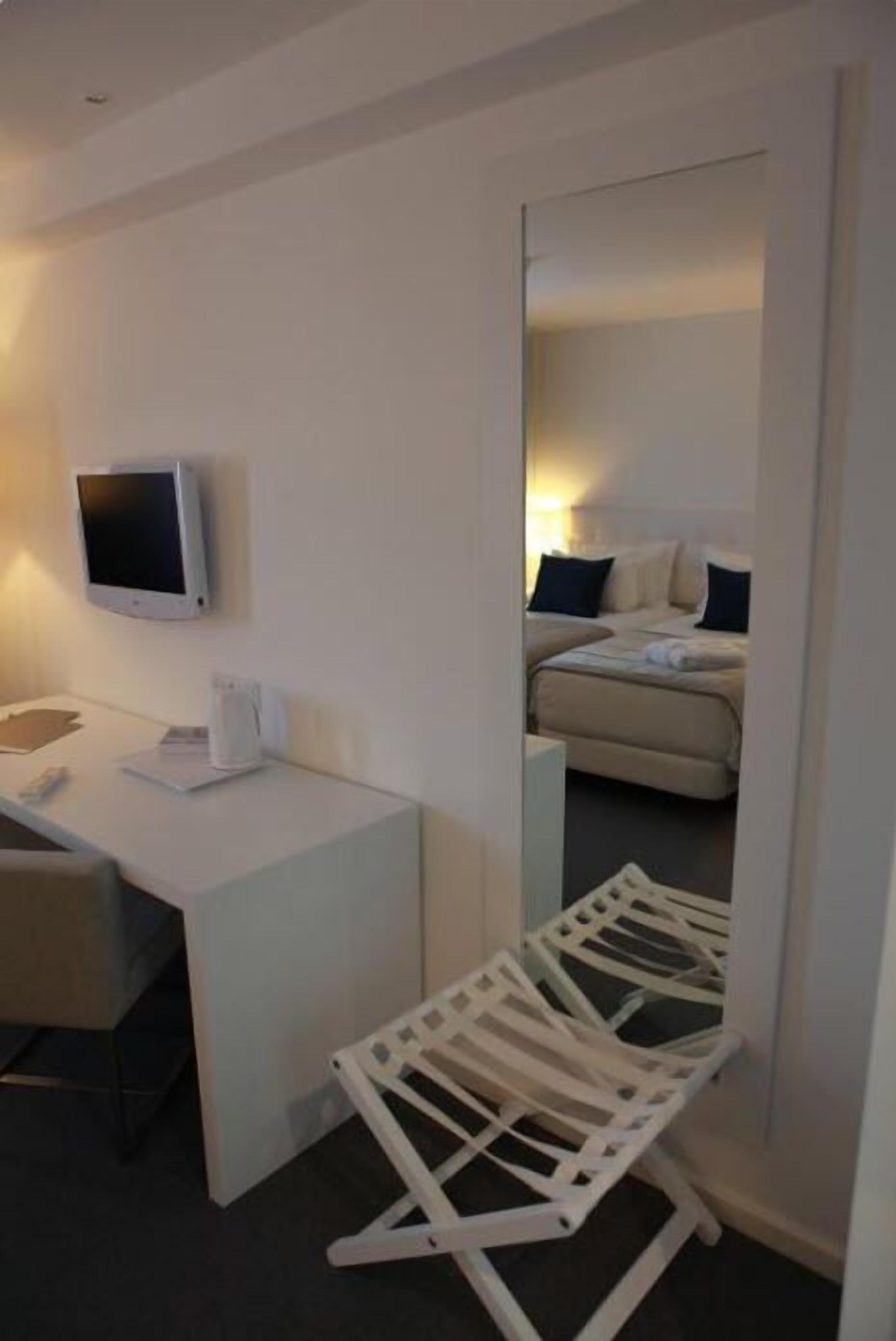 single room | memory-foam beds, minibar, in-room safe, individually decorated