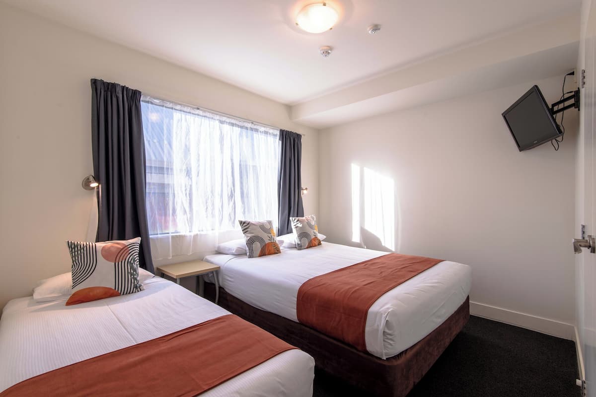 Apartment, 2 Bedrooms | Living area | Flat-screen TV, DVD player