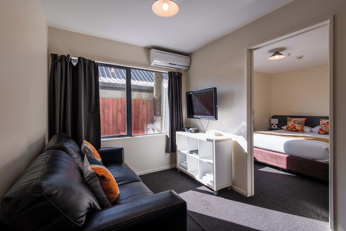Apartment, 2 Queen Beds | Living area | Flat-screen TV, DVD player