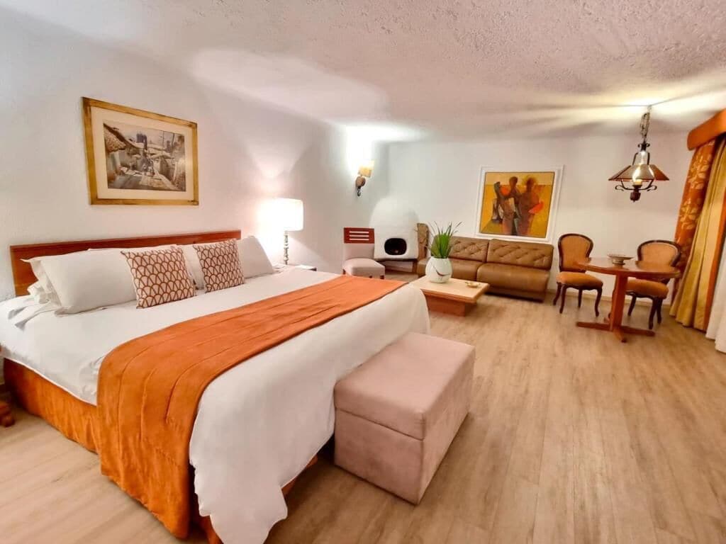 Executive Suite | Down duvets, minibar, in-room safe, individually decorated