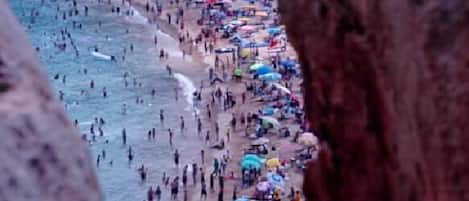 On the beach, white sand, rowing