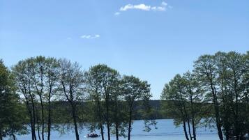 On the beach, beach towels, windsurfing, kayaking