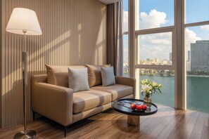 Premier Apartment | Living area | 50-inch LCD TV with cable channels, TV - Sun River Hotel (Da Nang)