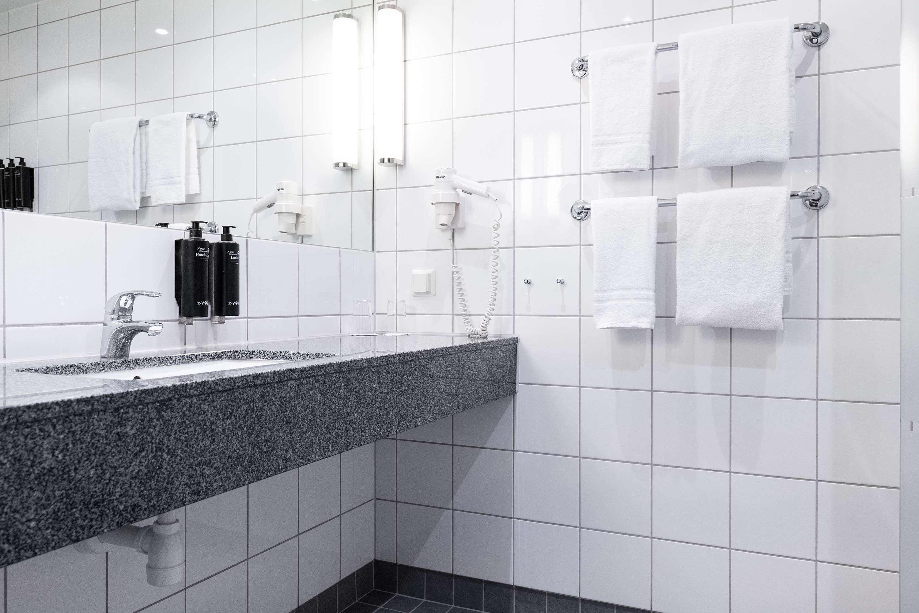 superior room, 1 king bed, non smoking | bathroom | shower, eco-friendly toiletries, hair dryer, towels