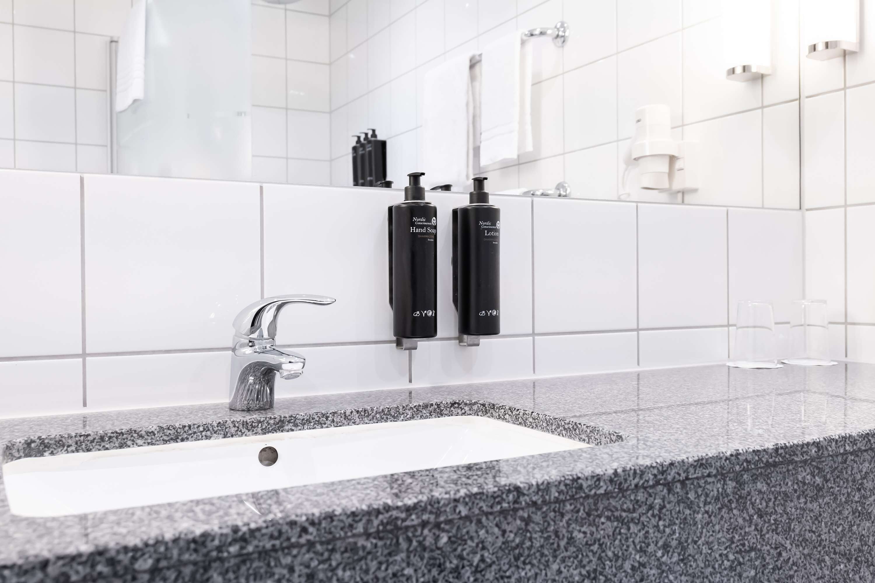 shower, eco-friendly toiletries, hair dryer, towels