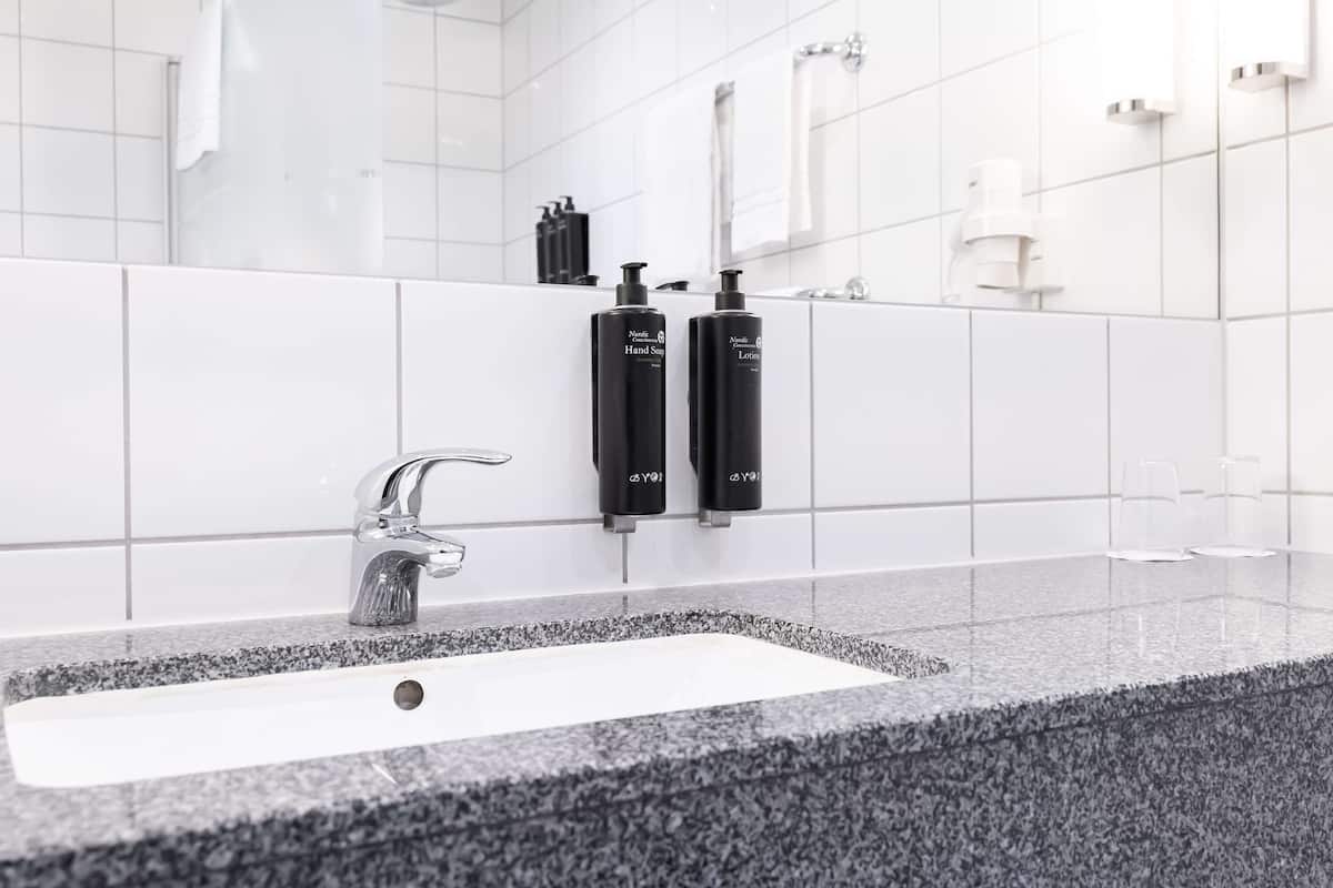 shower, eco-friendly toiletries, hair dryer, towels