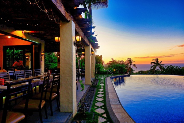 Outdoor pool, open 8:00 AM to 10:00 PM, sun loungers, lifeguards on site