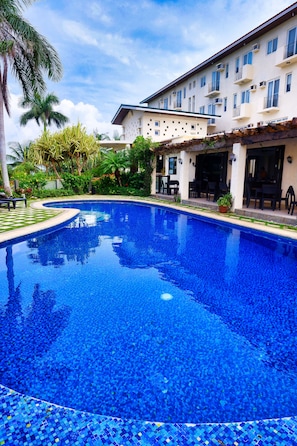 Outdoor pool, open 8:00 AM to 10:00 PM, sun loungers, lifeguards on site