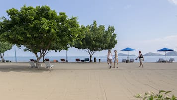 On the beach, beach umbrellas, beach towels