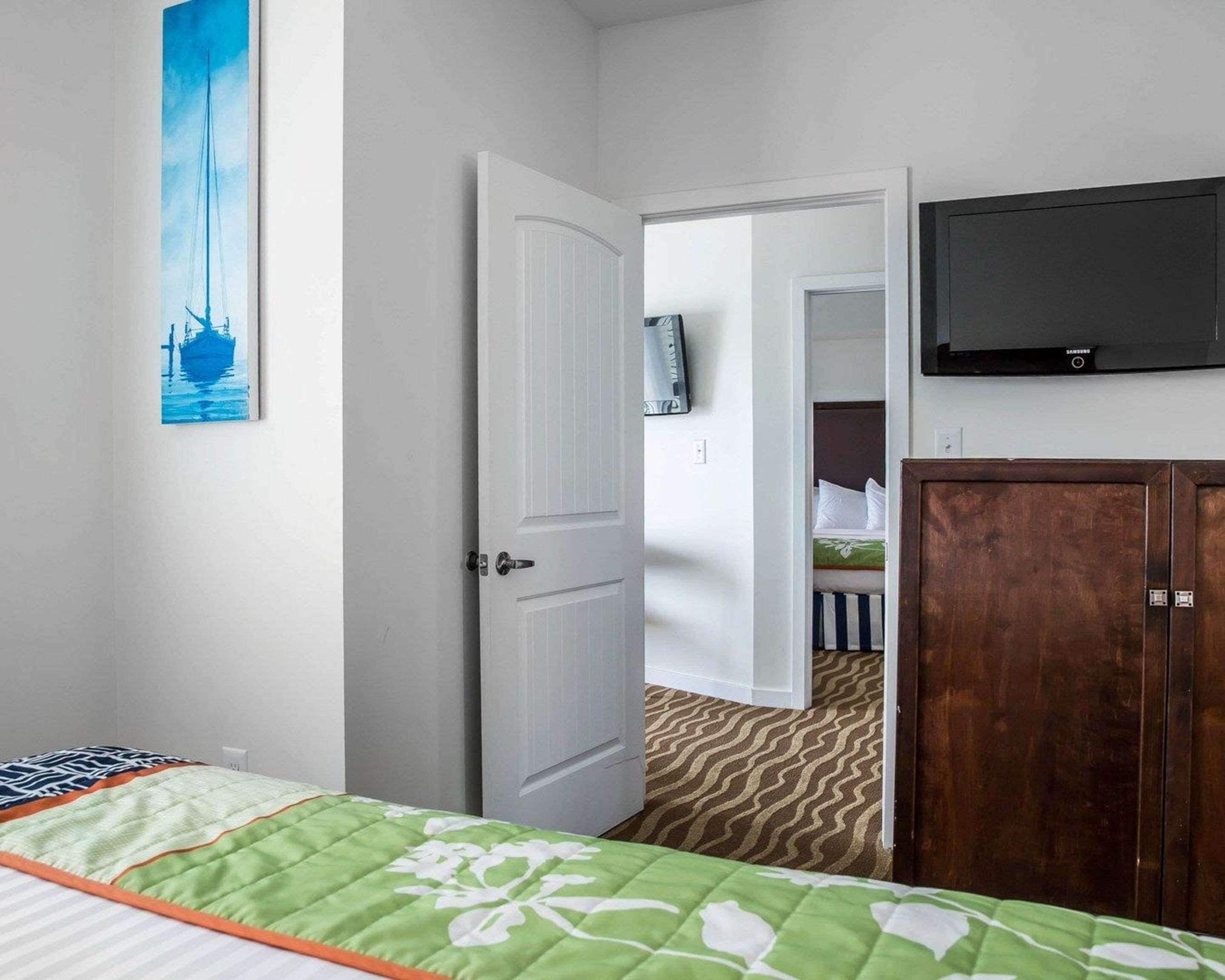 suite, multiple beds, accessible, non smoking | in-room safe, desk, laptop workspace, iron/ironing board
