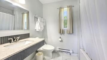 Combined shower/bathtub, deep-soaking bathtub, rainfall showerhead