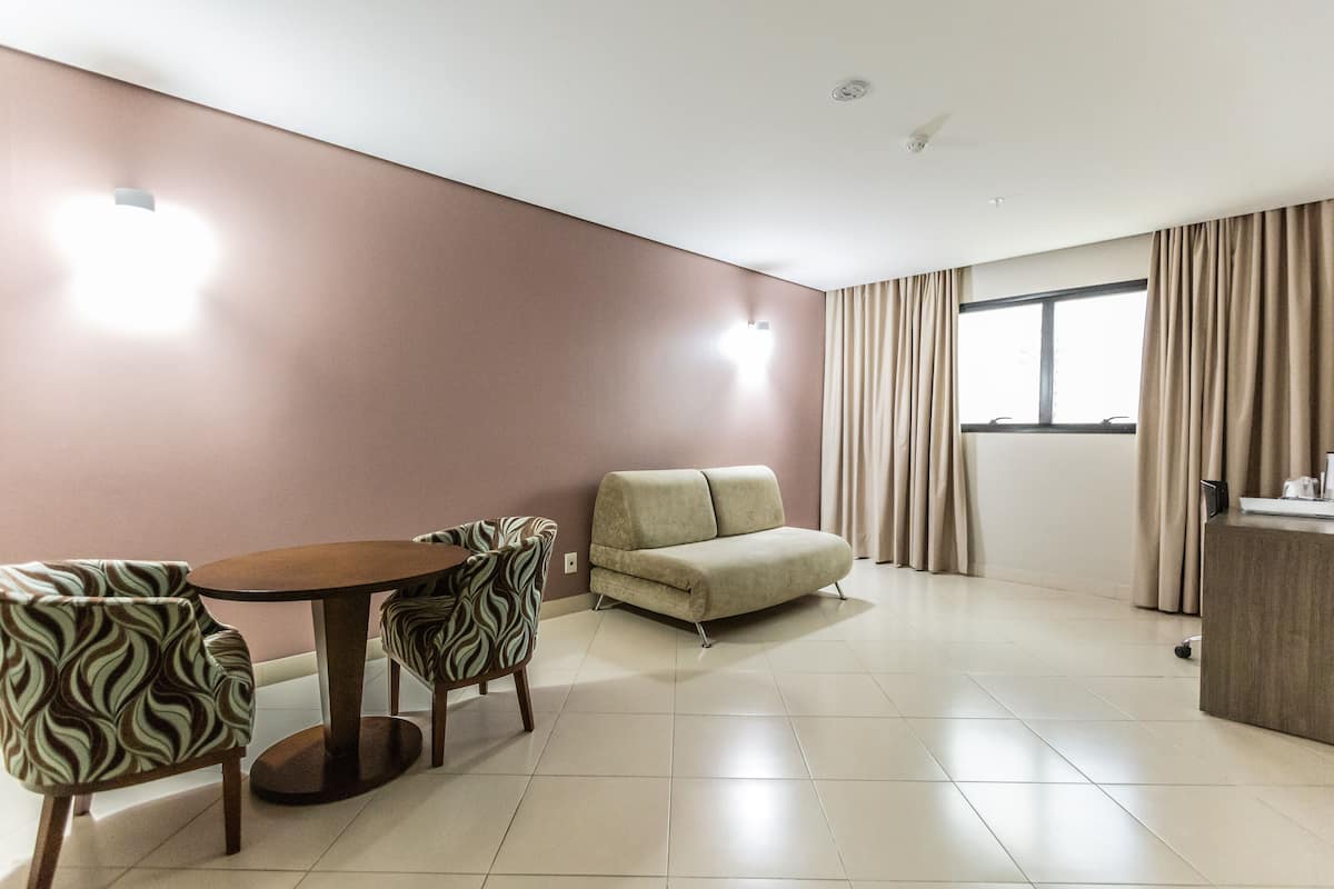 premium room, 1 king bed | premium bedding, minibar, in-room safe, desk