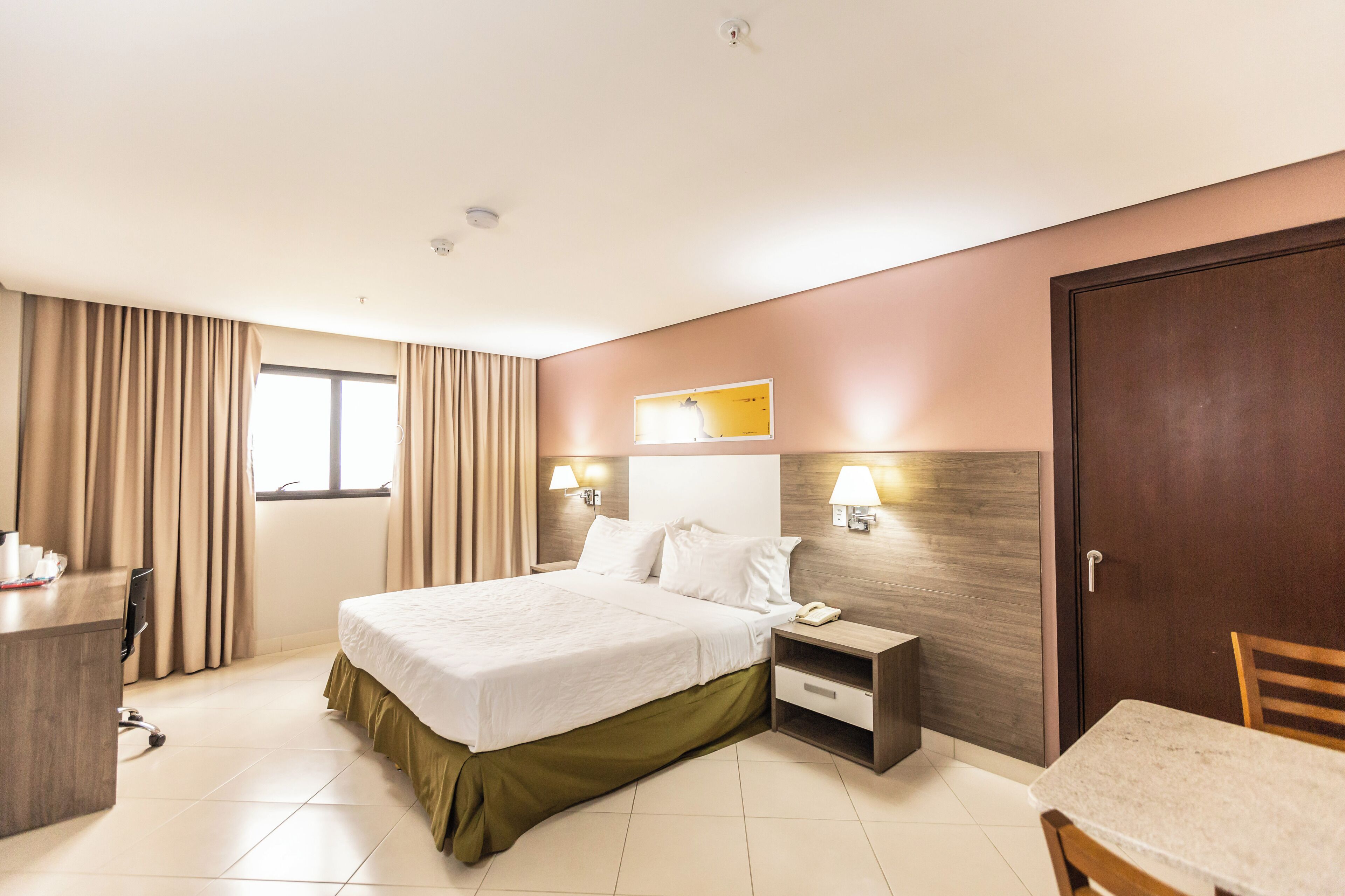 deluxe room | premium bedding, minibar, in-room safe, desk