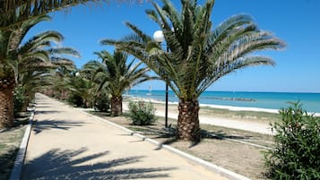 On the beach, free beach cabanas, sun-loungers, beach umbrellas