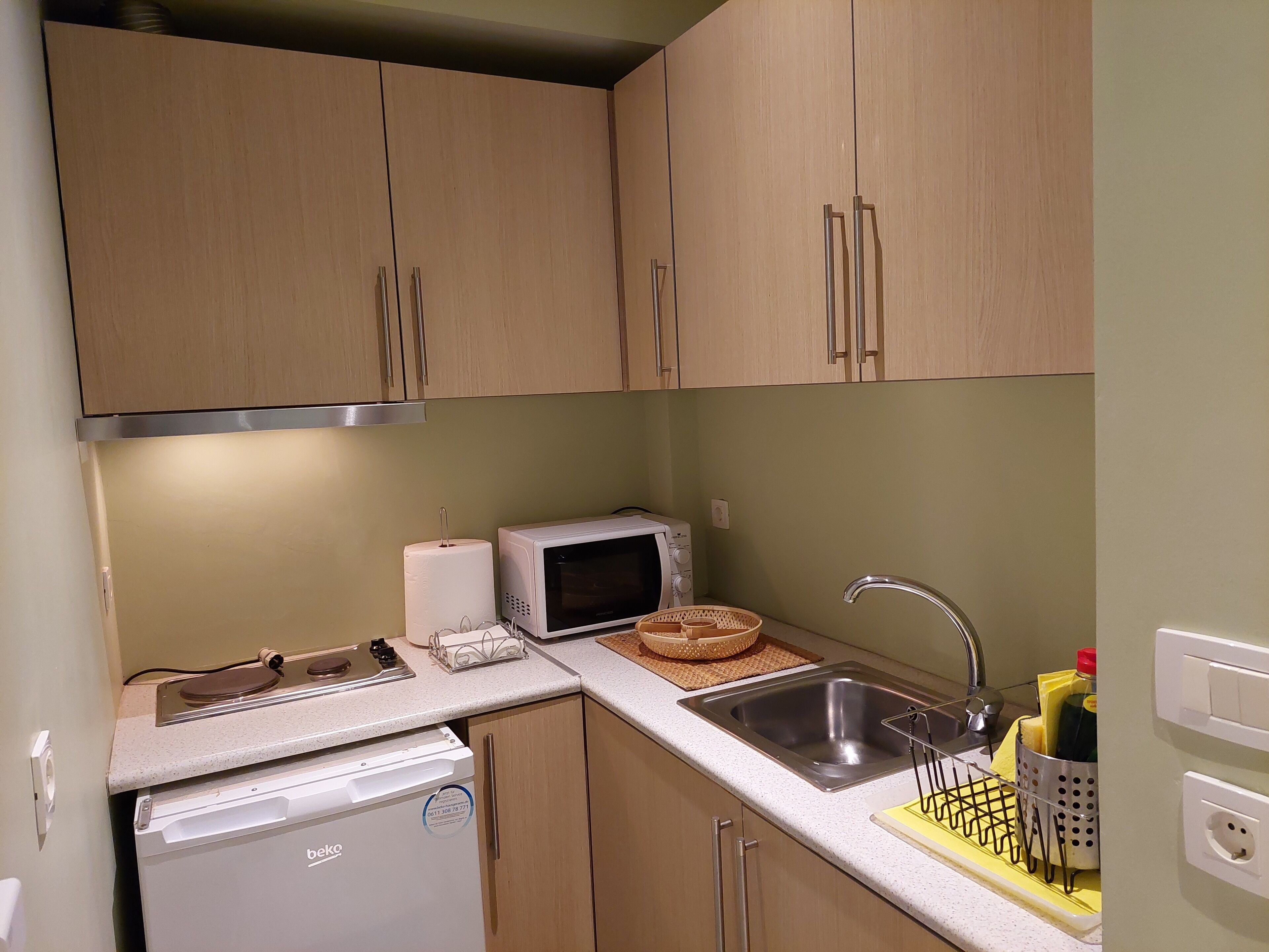 deluxe two-bedroom apartment | private kitchenette | coffee/tea maker, electric kettle, high chair