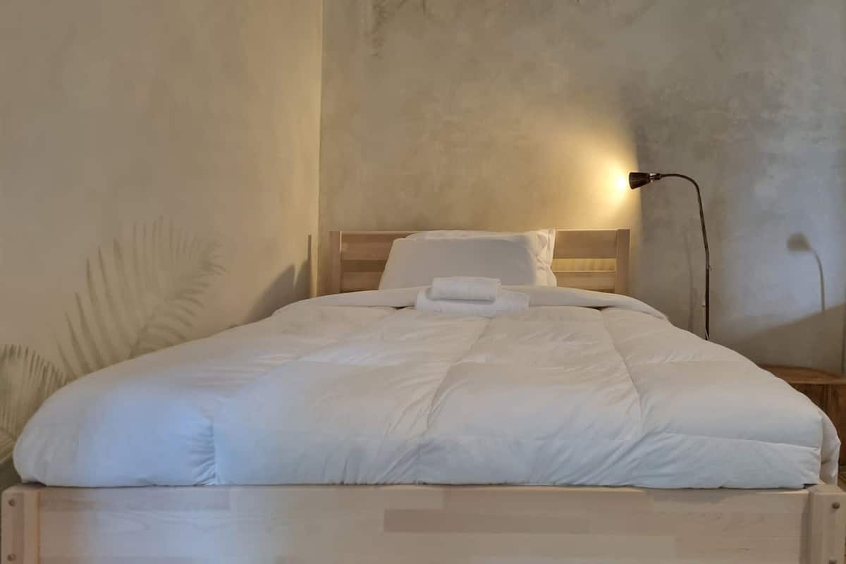 Down comforters, memory foam beds, in-room safe, desk