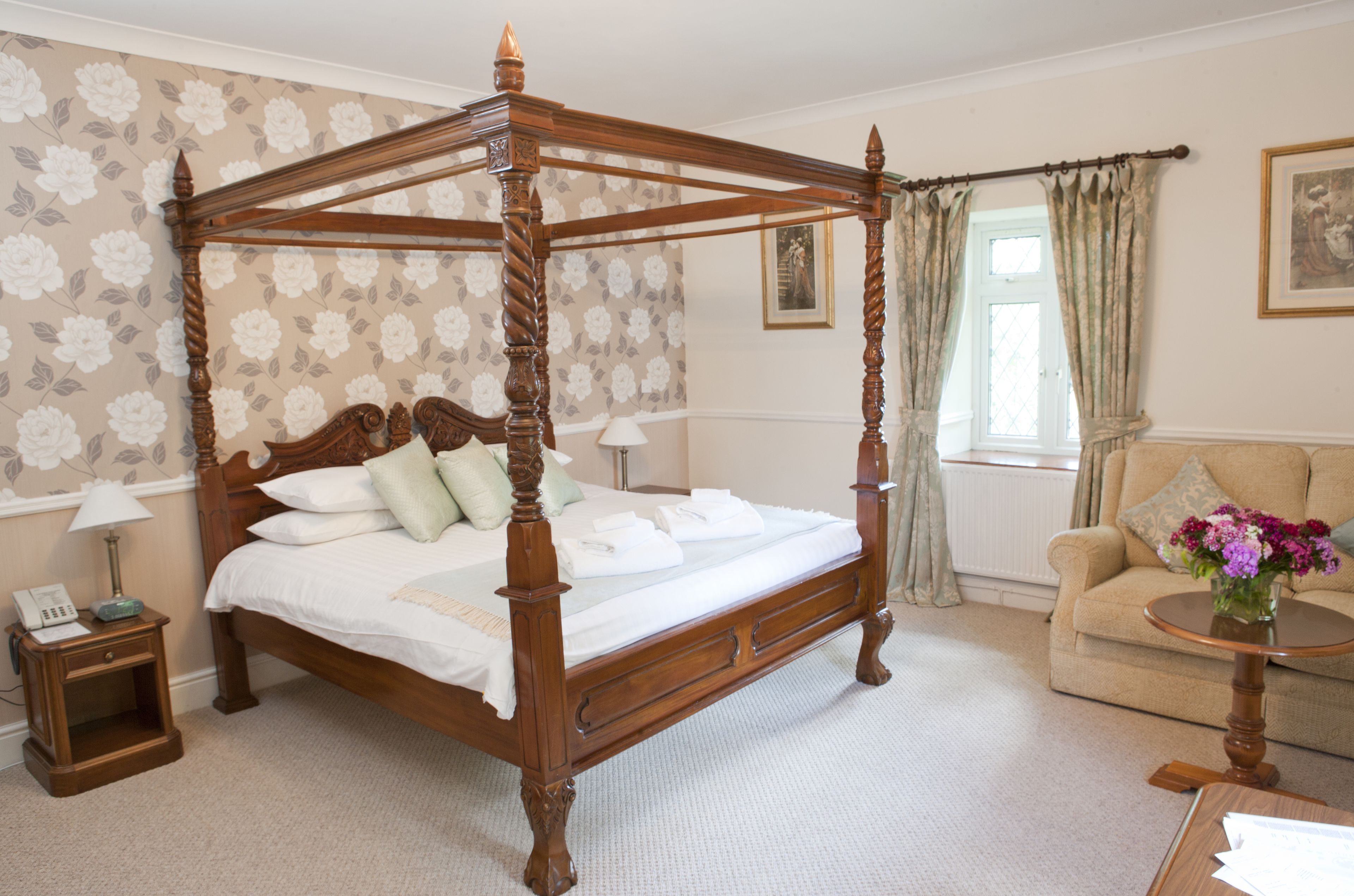 premium double room (four poster bed) | 1 bedroom, in-room safe, individually decorated, individually furnished