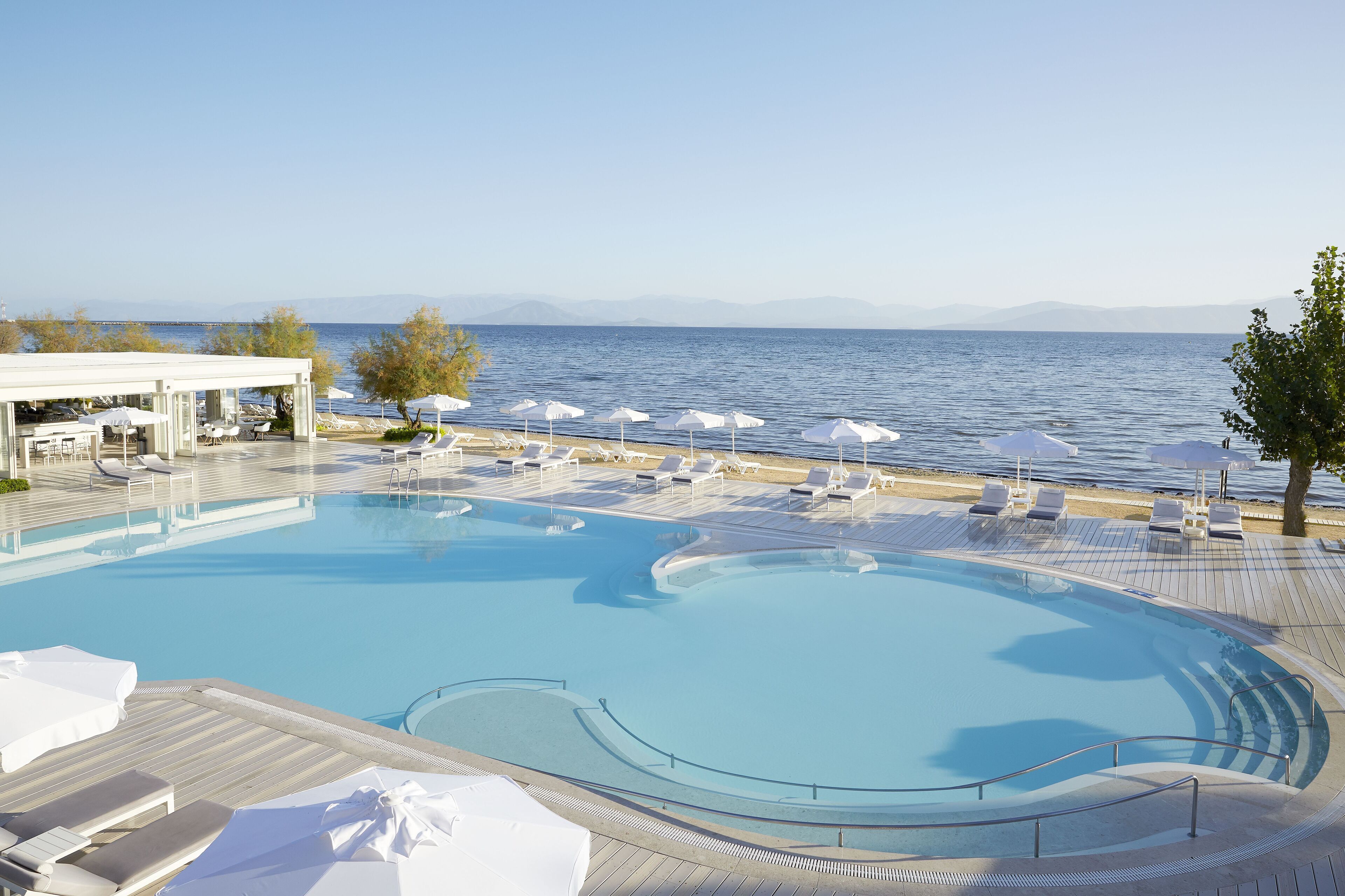 2 outdoor pools, pool umbrellas, pool loungers