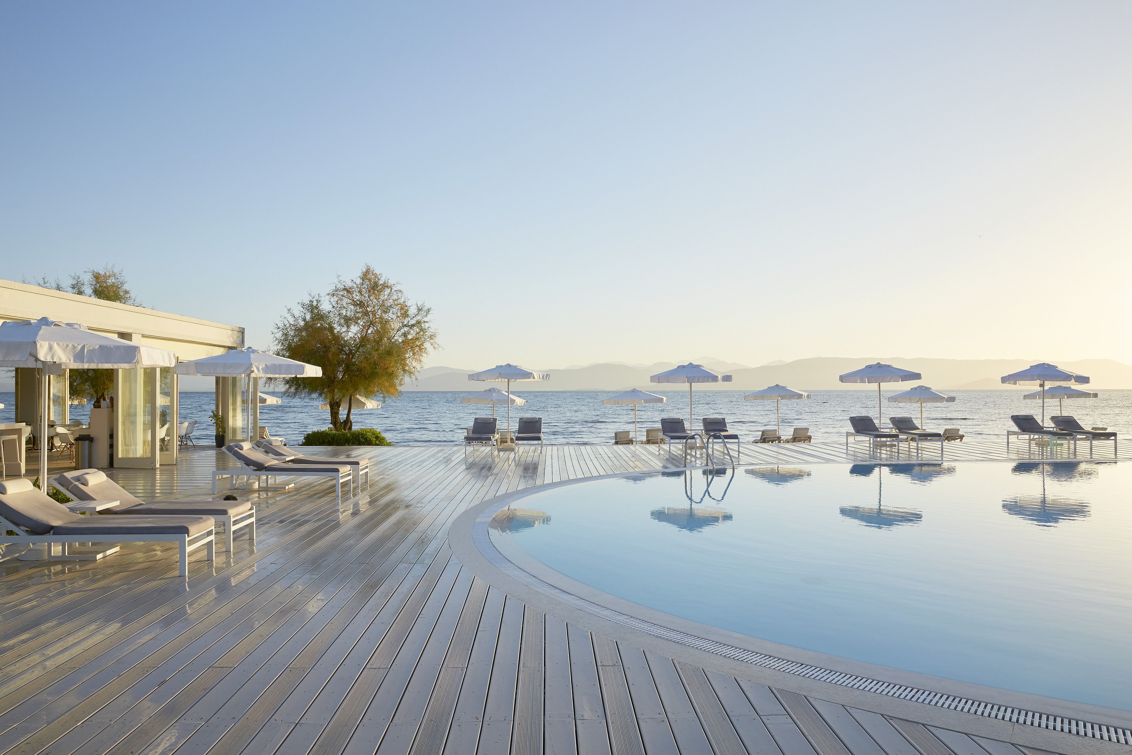 2 outdoor pools, pool umbrellas, pool loungers