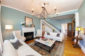 Habitación de lujo, 1 cama King size | Área de sala de estar