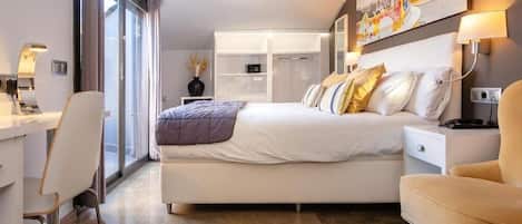 Junior Suite Terrace | Down comforters, in-room safe, desk, iron/ironing board