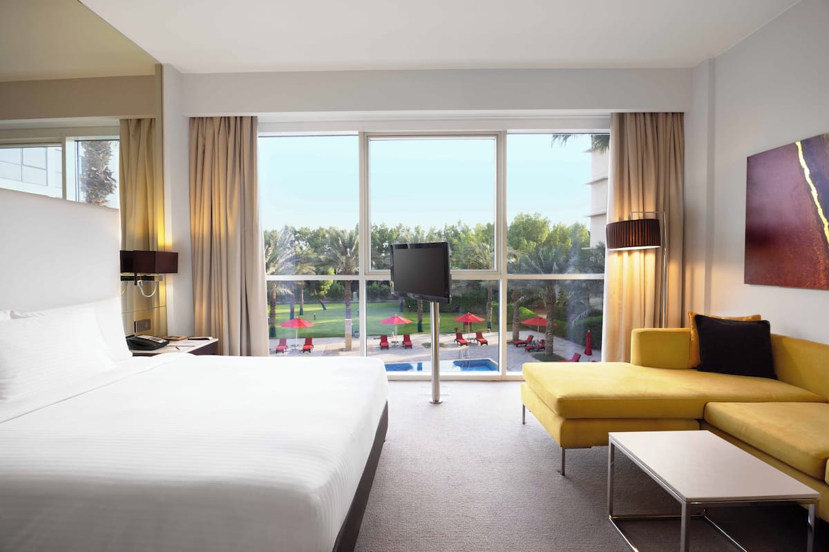 Studio, Kitchenette, Pool View | Pool | Outdoor pool, open 7:00 AM to 9:00 PM, pool umbrellas, sun loungers