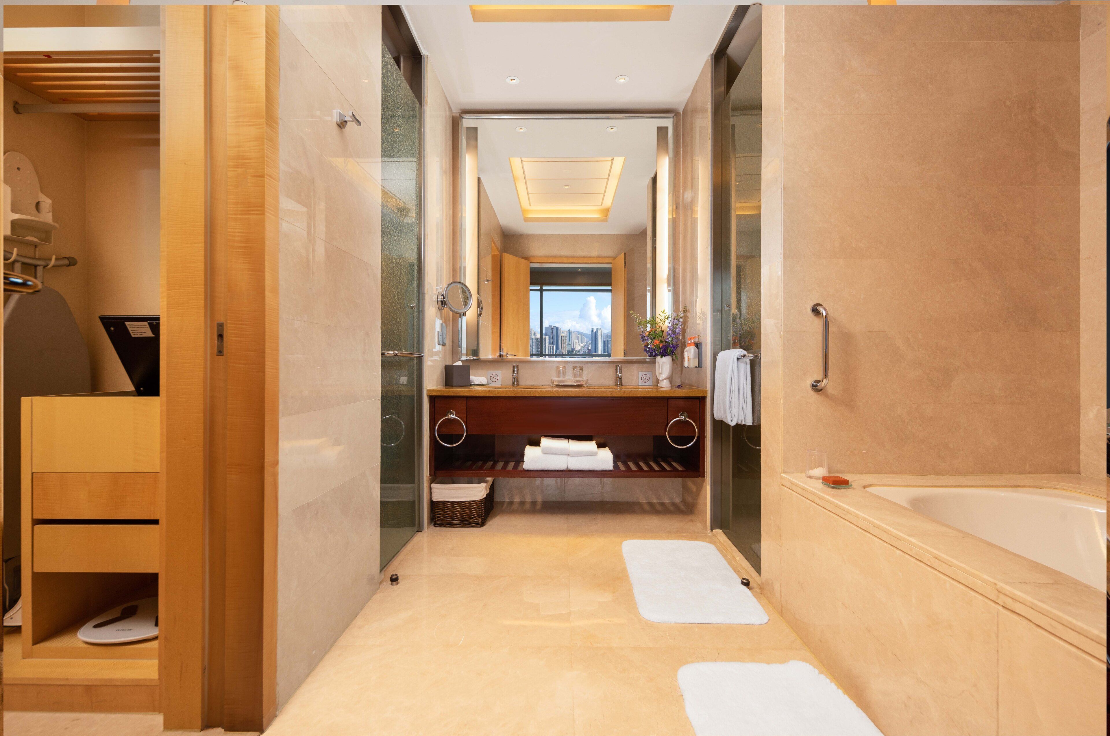 Separate bathtub and shower, rainfall showerhead, free toiletries