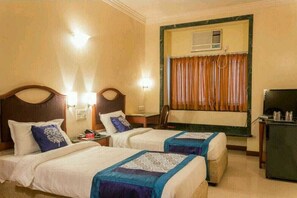 In-room safe, desk, blackout curtains, soundproofing - Strand Hotel (Mumbai)