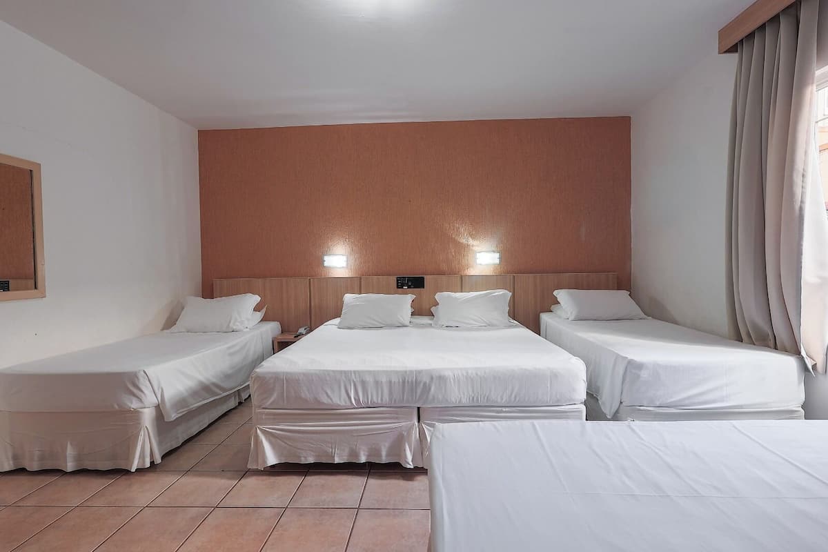 Quarto família (Quintuplo) | 1 quarto, frigobar, cofres nos quartos, cortinas blackout