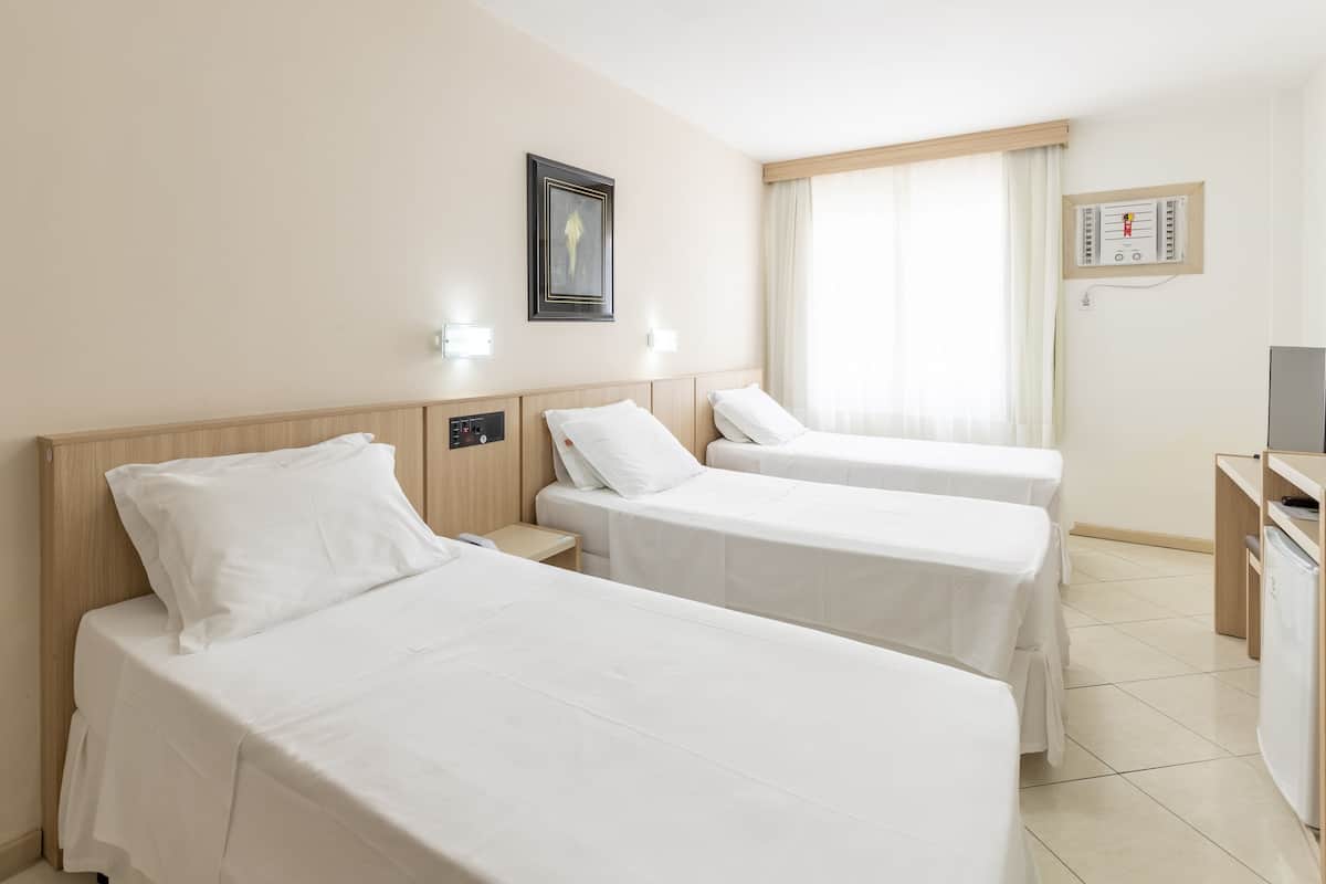 Standard Triple Room | 1 bedroom, minibar, in-room safe, blackout drapes
