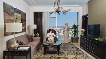 Suite, 1 King Bed (Kaaba) | Living area | 32-inch LCD TV with satellite channels, TV