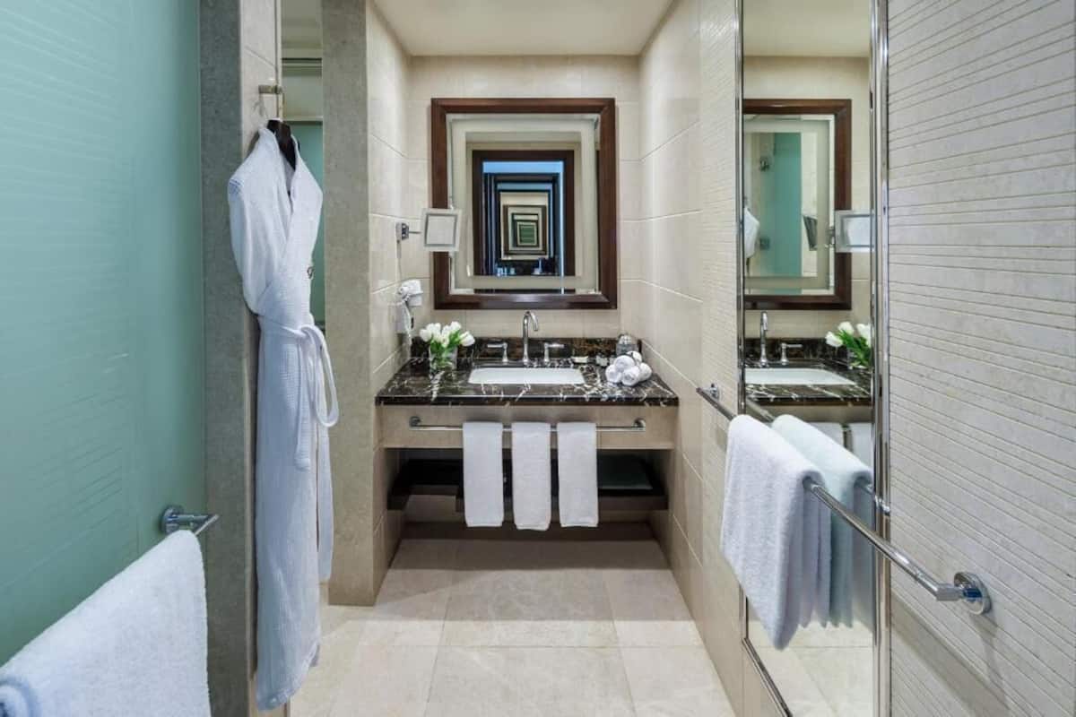 Shower, rainfall showerhead, designer toiletries, hair dryer