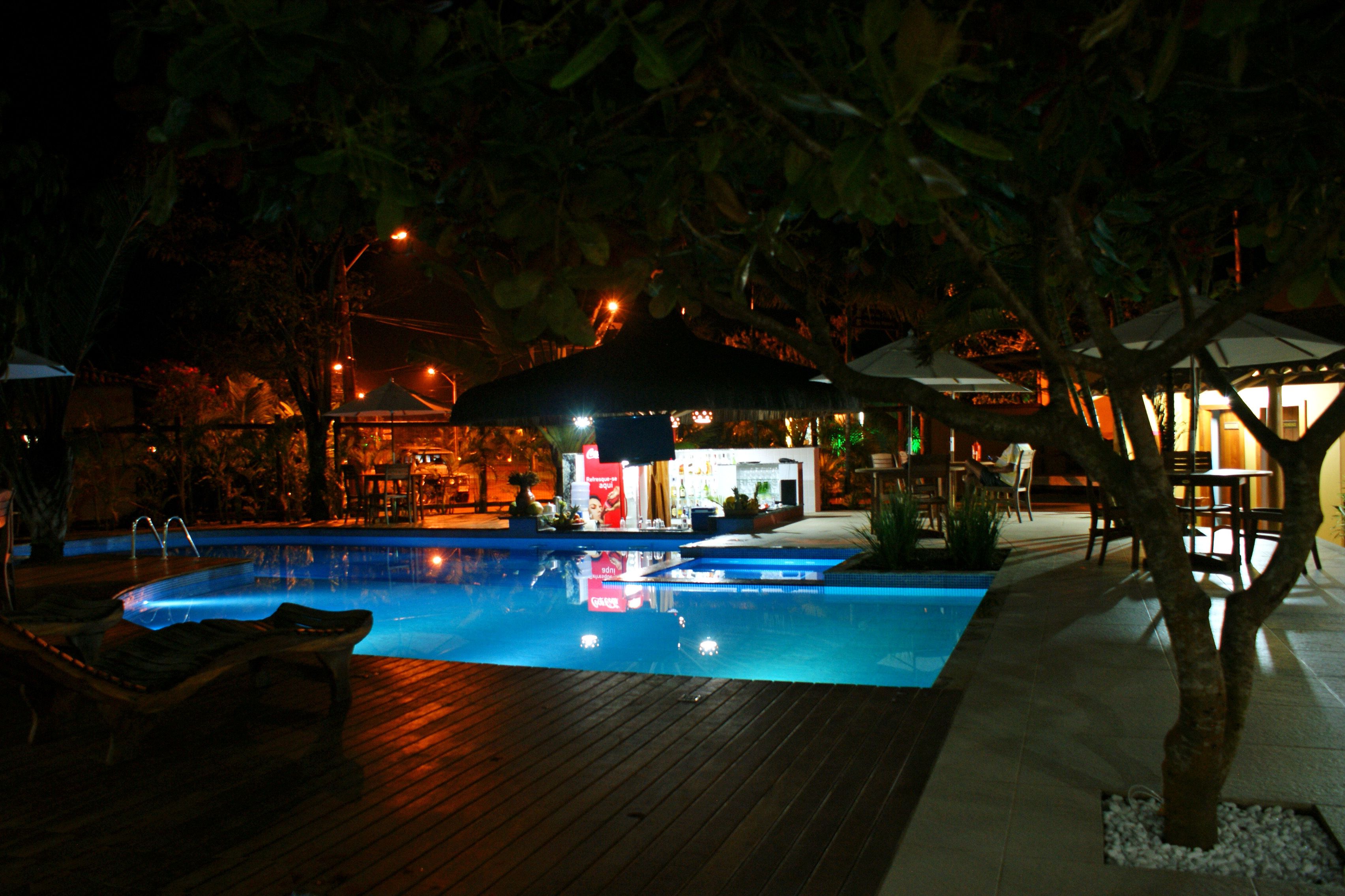 outdoor pool, pool umbrellas, pool loungers